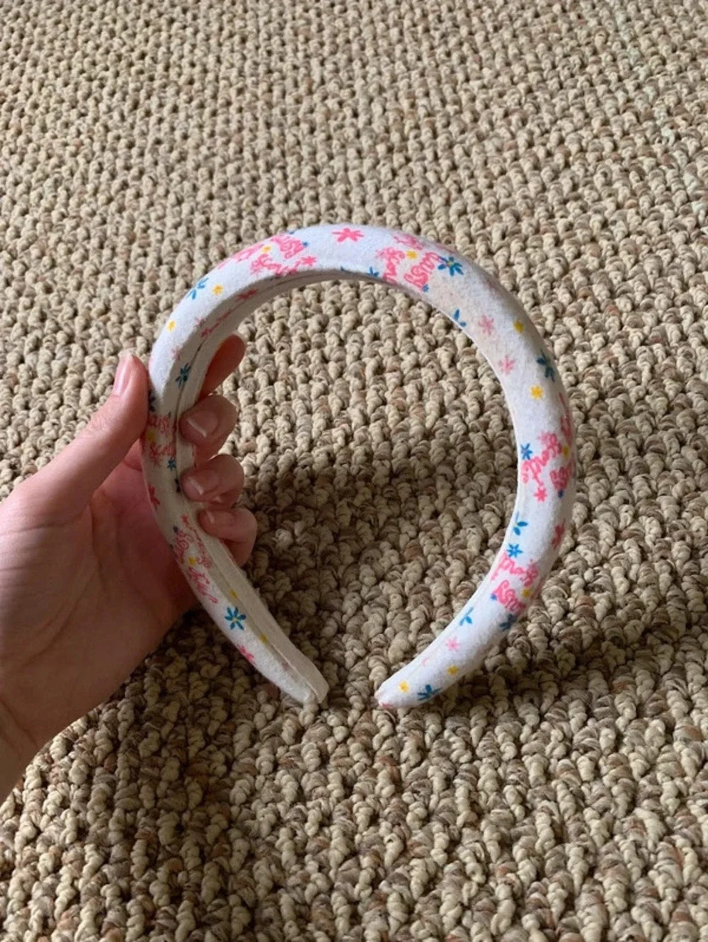 white and pink pattered headband